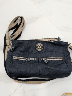 Kipling Black Crossbody Bag with Tan-Accented Strap